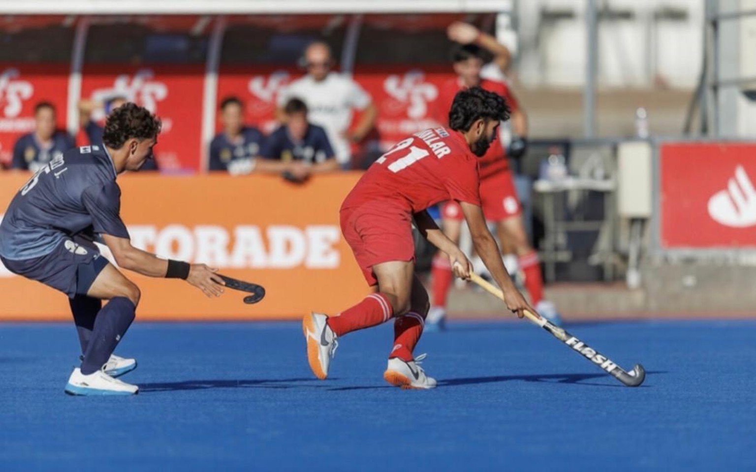 Field hockey action photograph 4